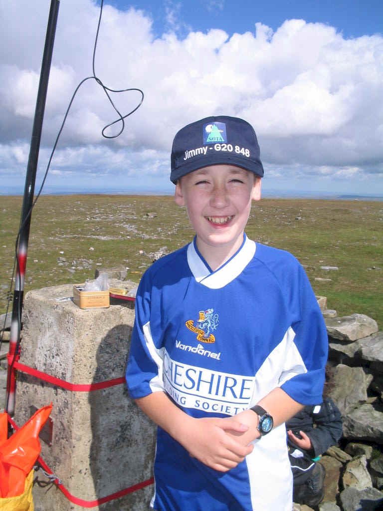 Jimmy at the summit of Cross Fell