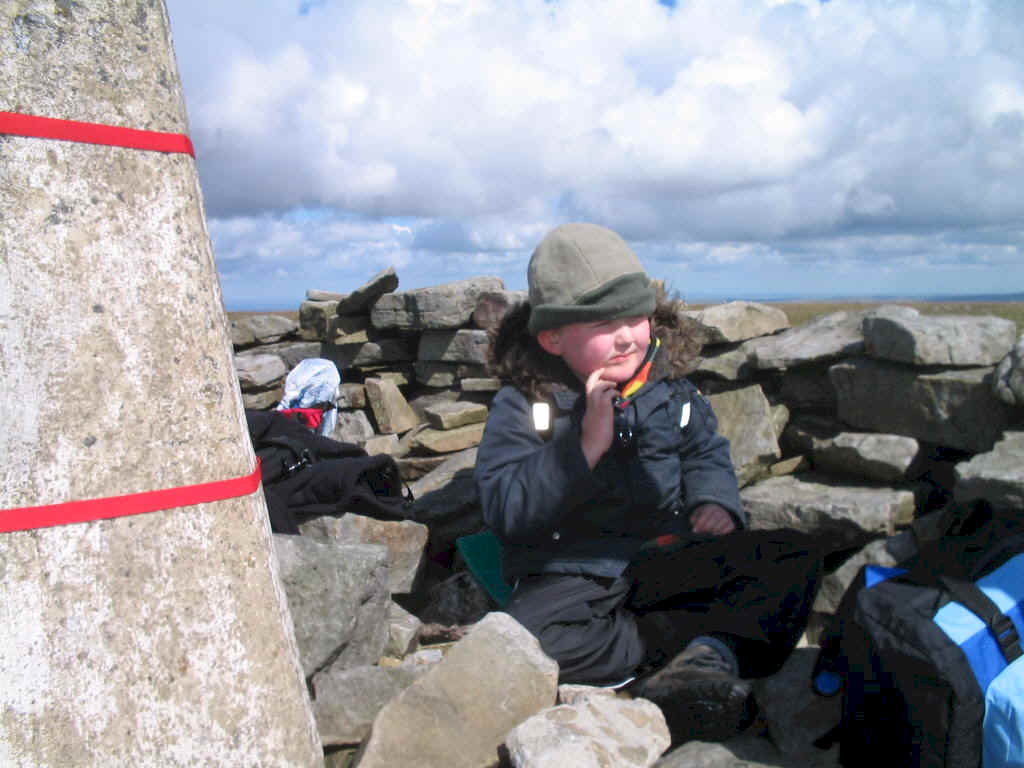 Liam at the summit of Cross Fell