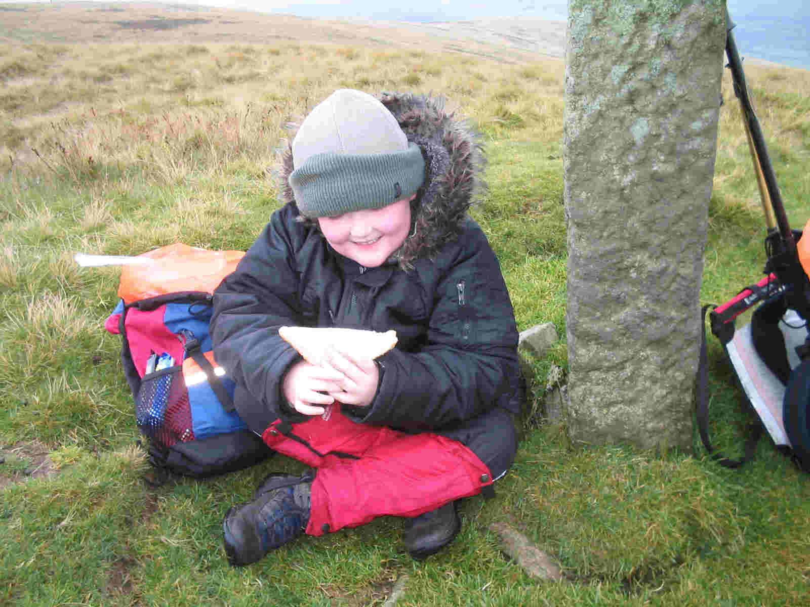 Liam devours his sandwiches at the summit!