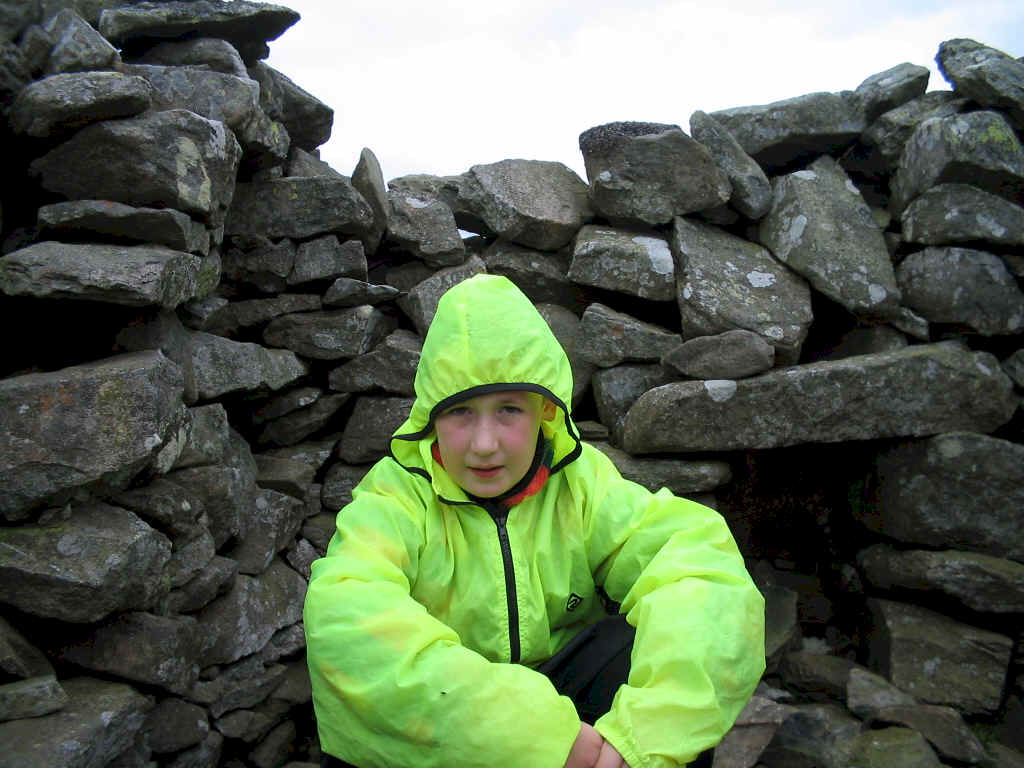 Jimmy in the summit shelter on NW-047