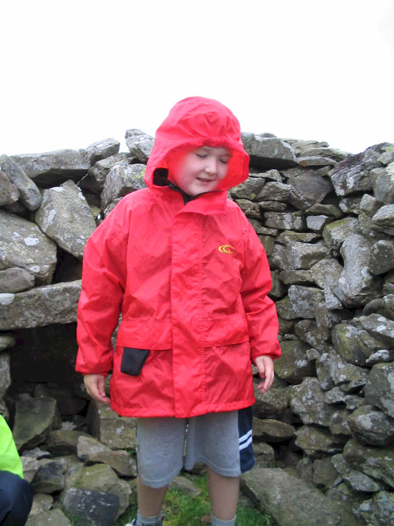 Liam in the summit shelter on NW-047