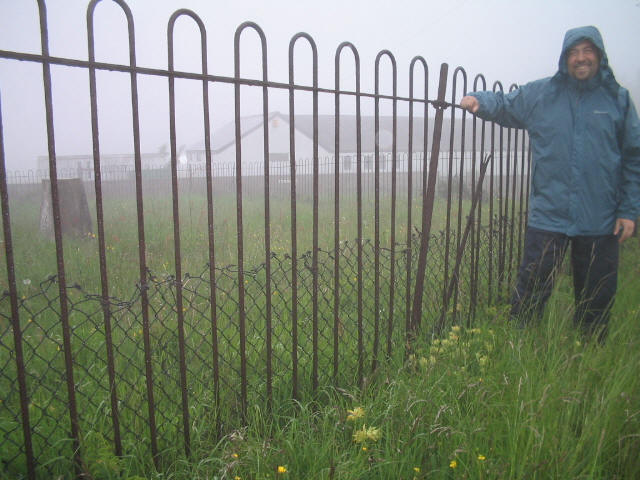 Tom on Ruardean Hill, trig point behind the fence!