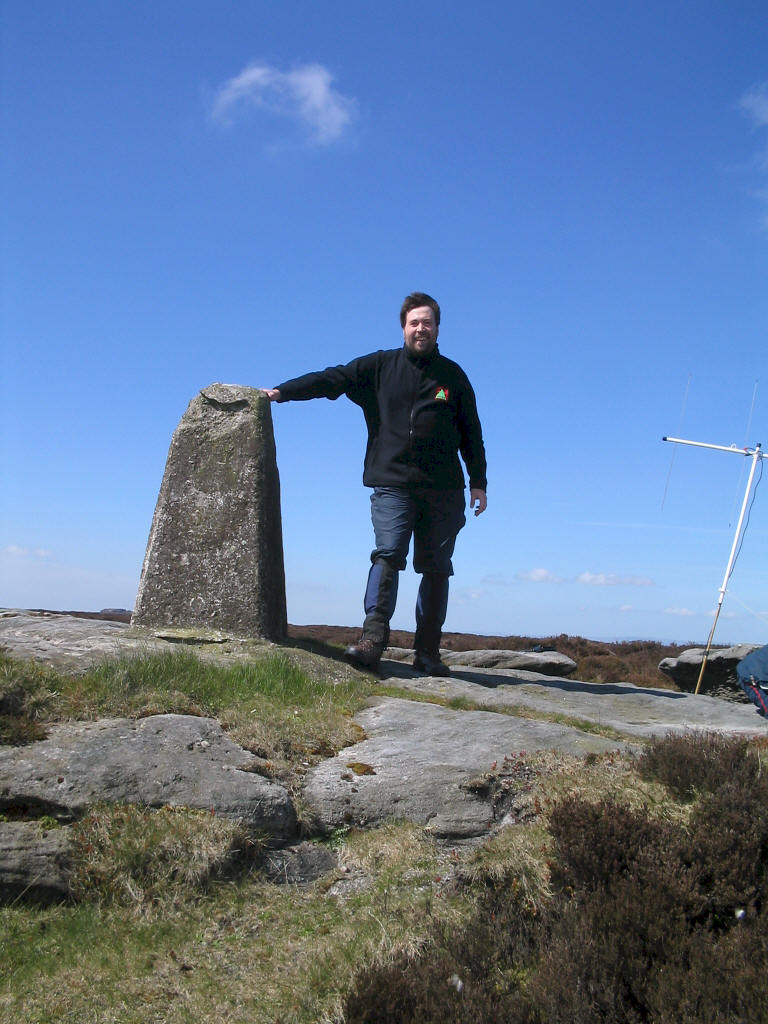 Tom on summit of Thorpe Fell Top